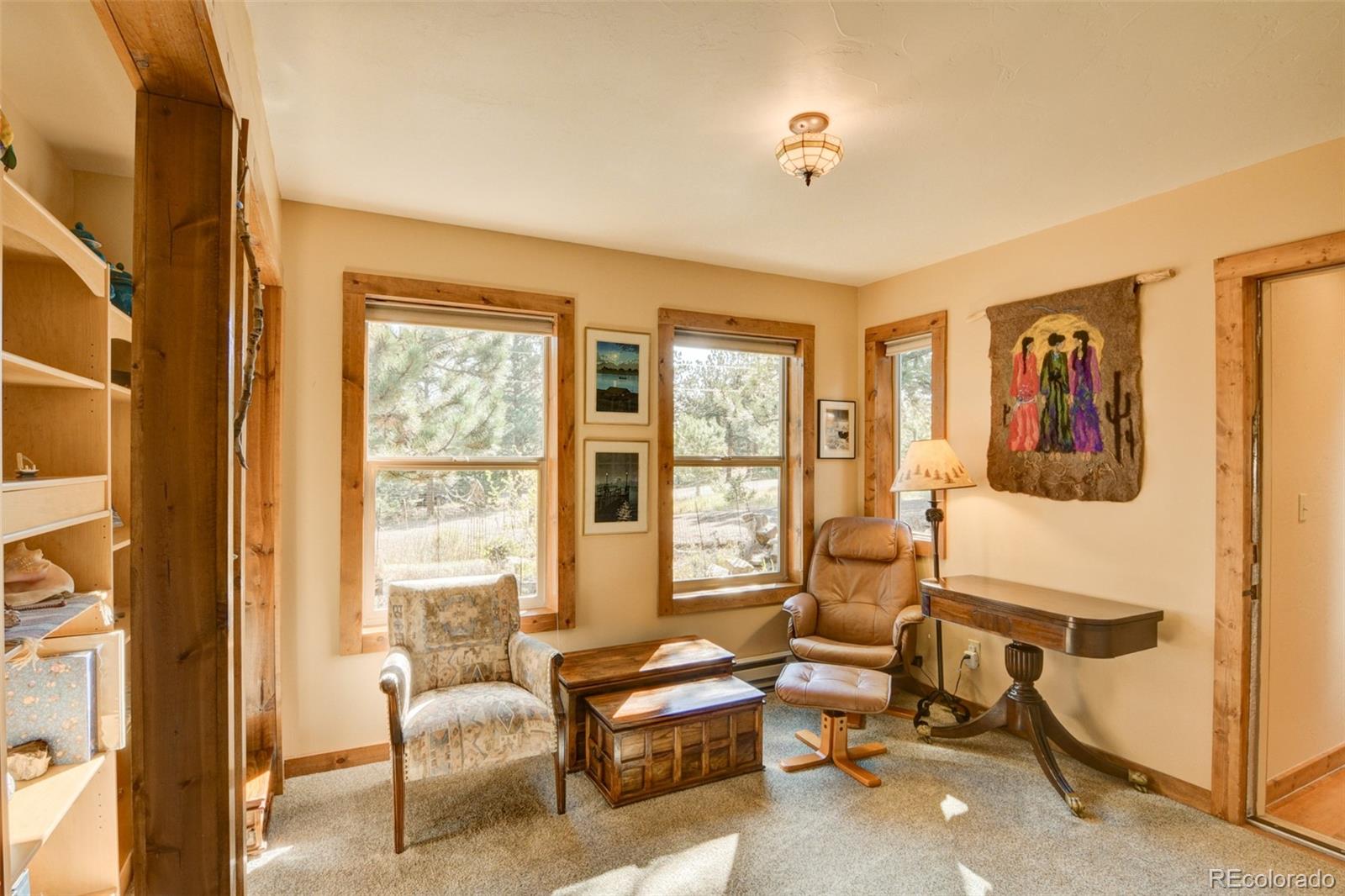 3296 Singletree Road Hartsel, CO 80449 - Photo 35 of 50 a bedroom with furniture and a window