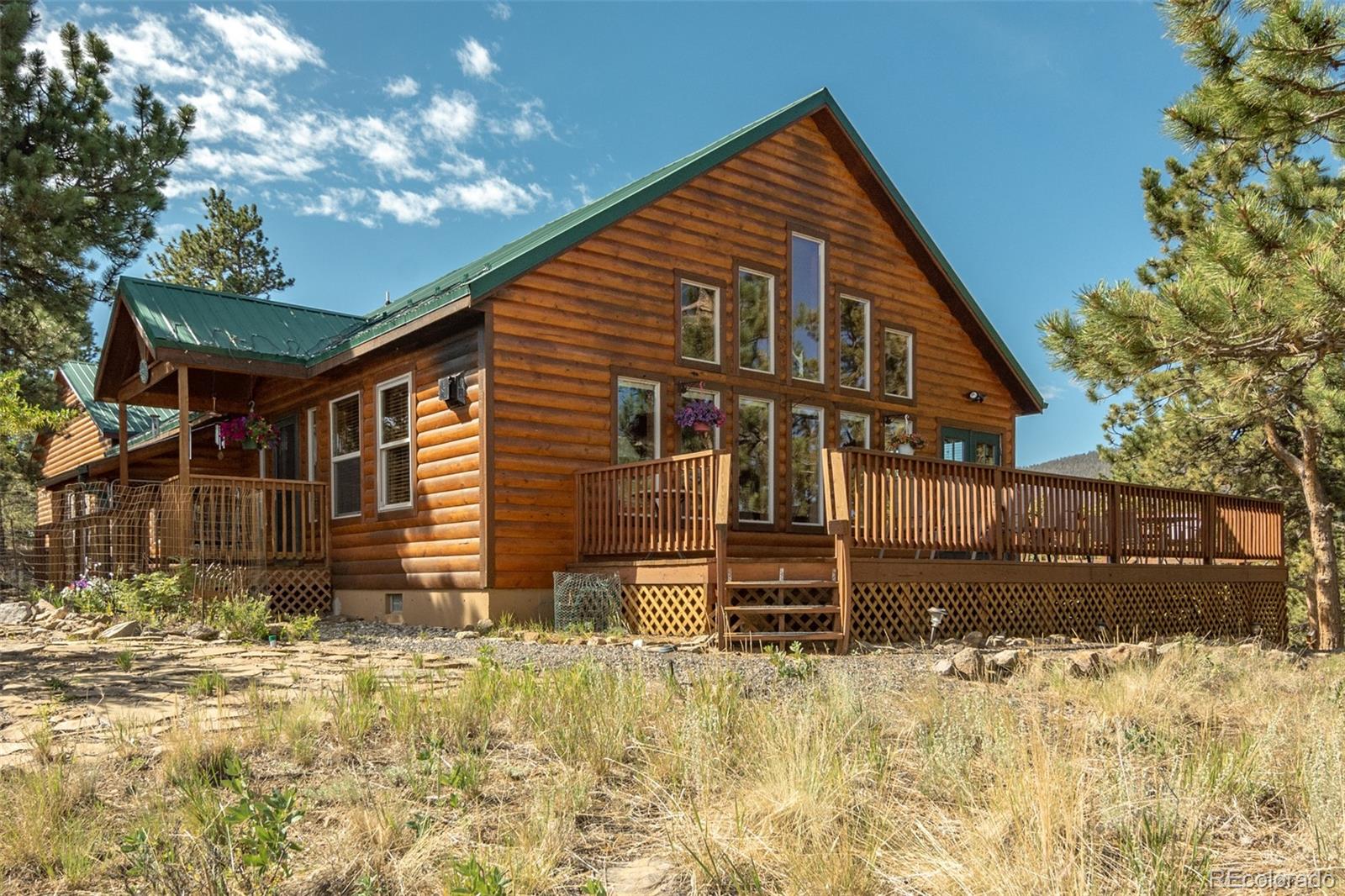 3296 Singletree Road Hartsel, CO 80449 - Photo 6 of 50 front view of a house with a yard