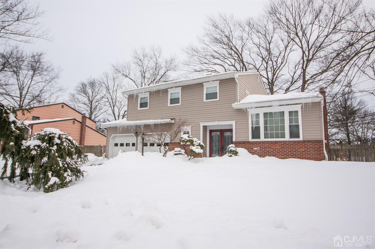 9 Library Place Edison, NJ 08820 - Photo 1 of 44 a view of a covered with snow in the yard