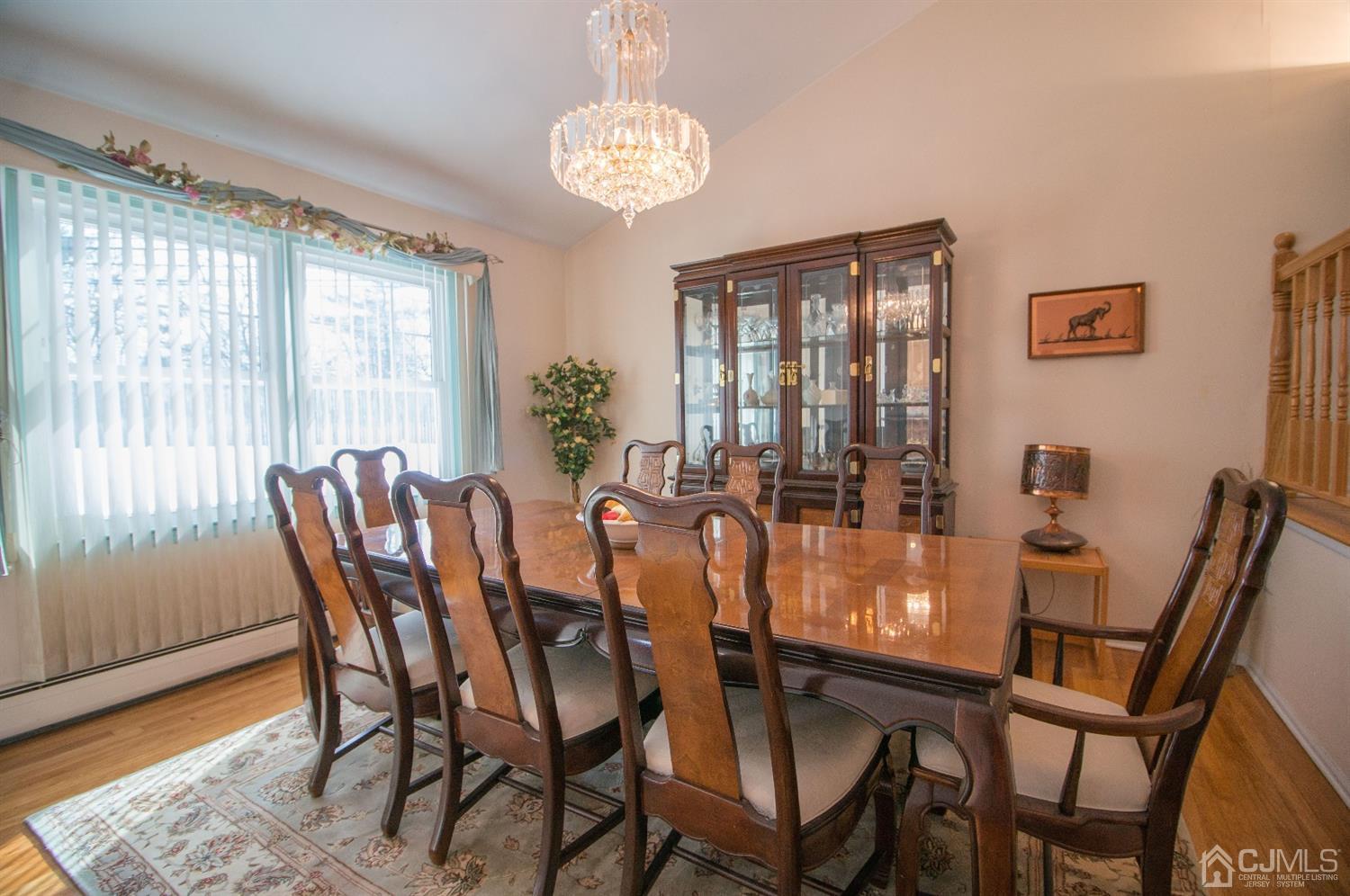 9 Library Place Edison, NJ 08820 - Photo 14 of 44 a dining room with furniture and window