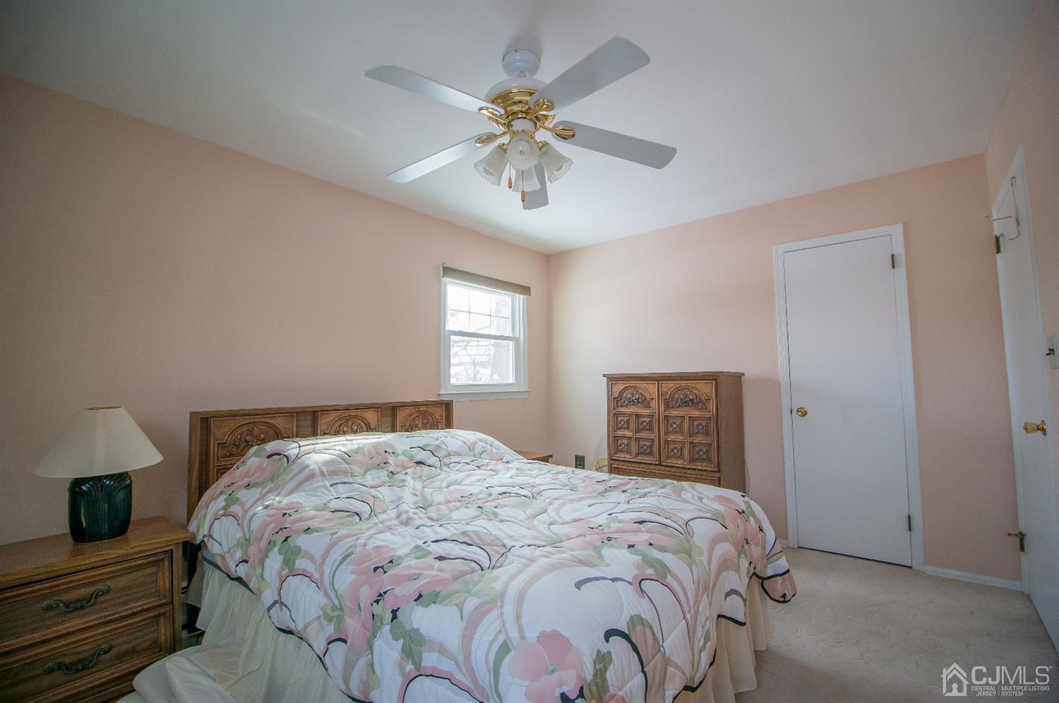9 Library Place Edison, NJ 08820 - Photo 32 of 44 a bedroom with a bed and window