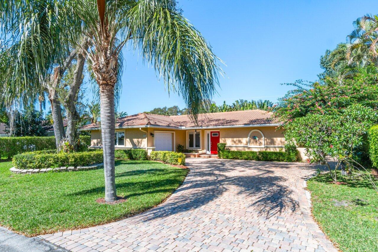 1011 Northwest 6th Street Boca Raton, FL 33486 - Photo 1 of 1 Welcoming approach to home!