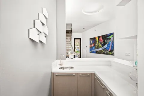 a living room with furniture fireplace and a flat screen tv