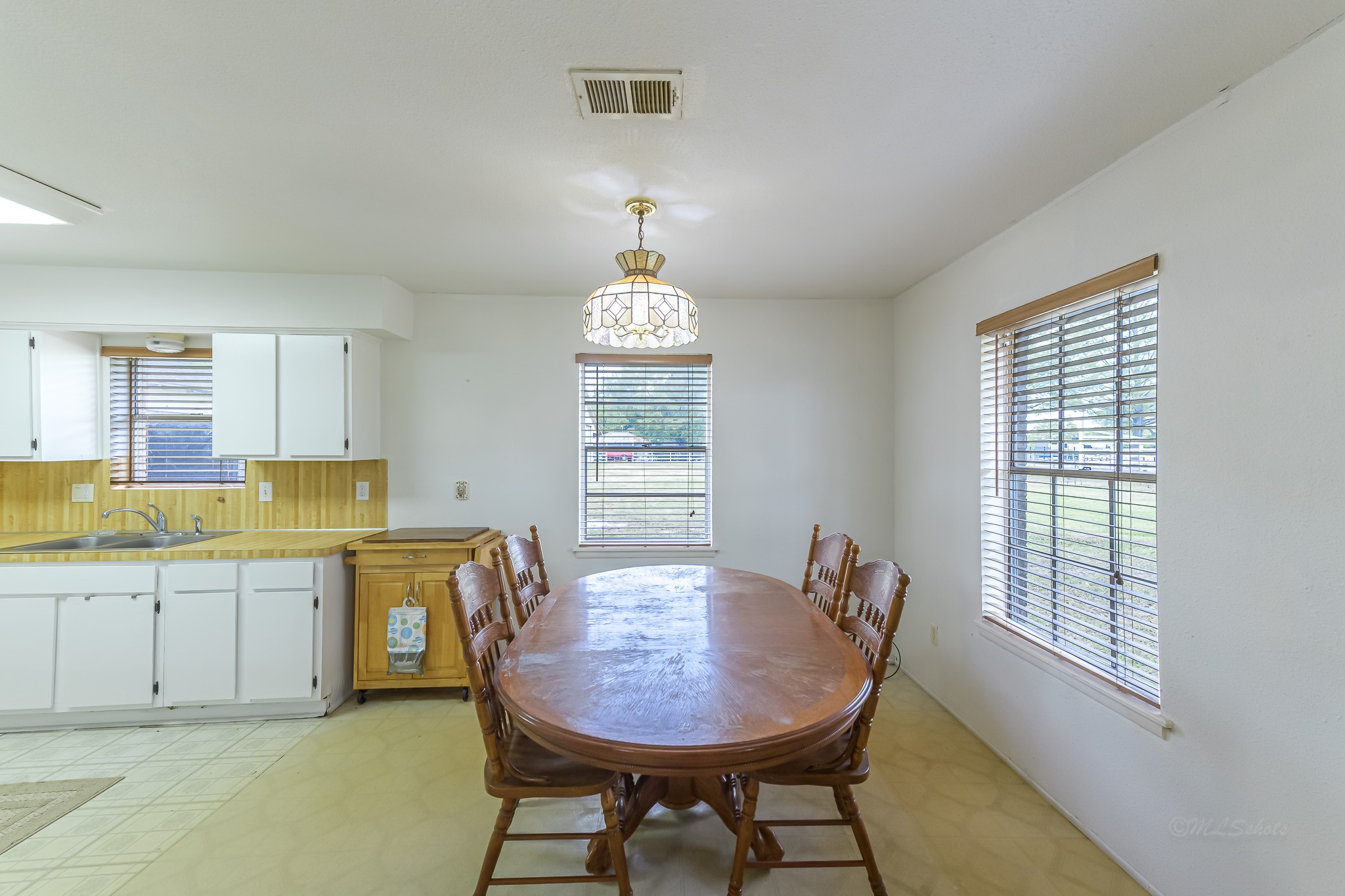 29519 Marti Road Katy, TX 77493 - Photo 11 of 46 Casual dining space features bright windows.