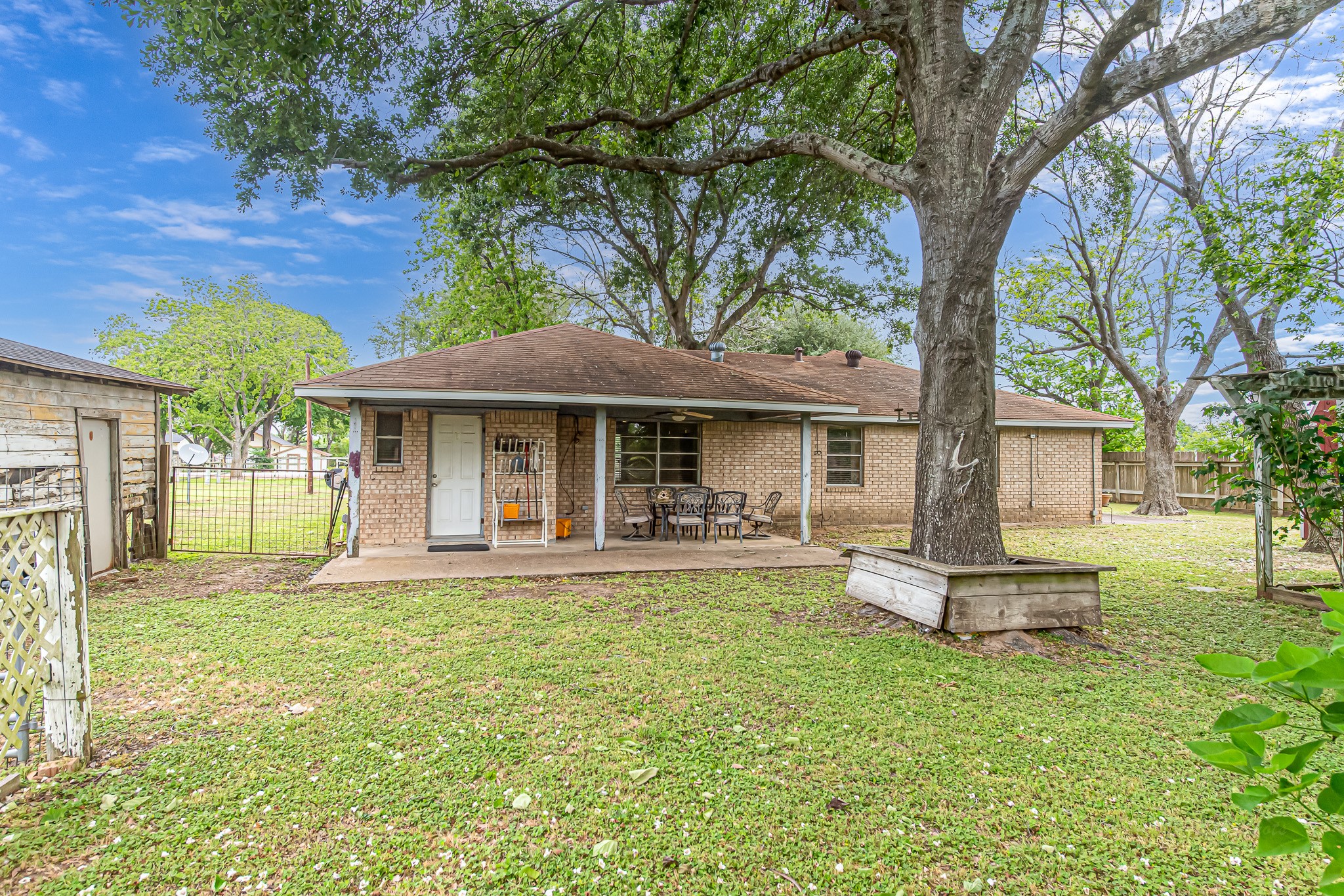 29519 Marti Road Katy, TX 77493 - Photo 30 of 46 Rear view of home with back door to utility and kitchen.