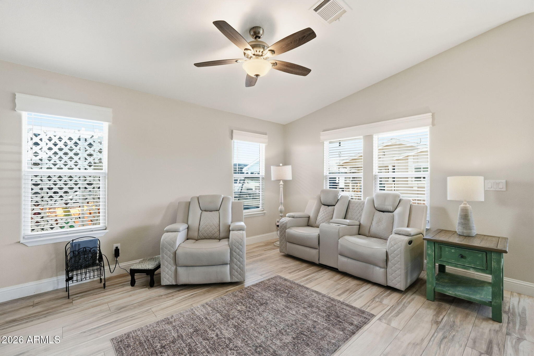 8865 East Baseline Road, Unit 1417 Mesa, AZ 85209 - Photo 2 of 47 a living room with furniture and a large window