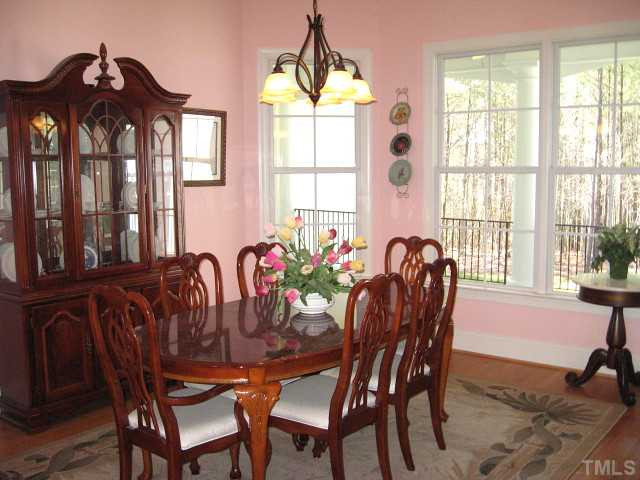 3740 Mason Road New Hill, NC 27562 - Photo 6 of 20 Formal dining area with arched/columnar entrance & 12' ceiling Dining Room