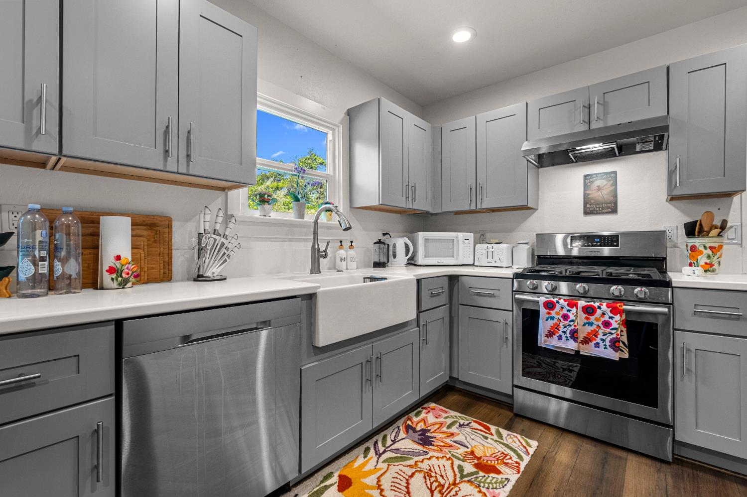 320 Taylor Road Newcastle, CA 95658 - Photo 21 of 75 a kitchen with stainless steel appliances white cabinets sink and a stove
