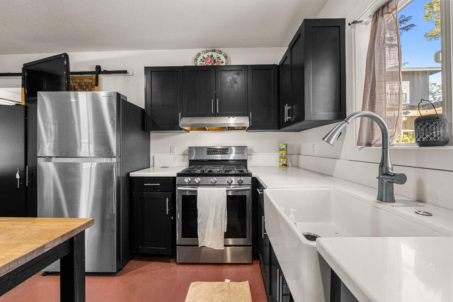 320 Taylor Road Newcastle, CA 95658 - Photo 43 of 75 a kitchen with a refrigerator stove and sink