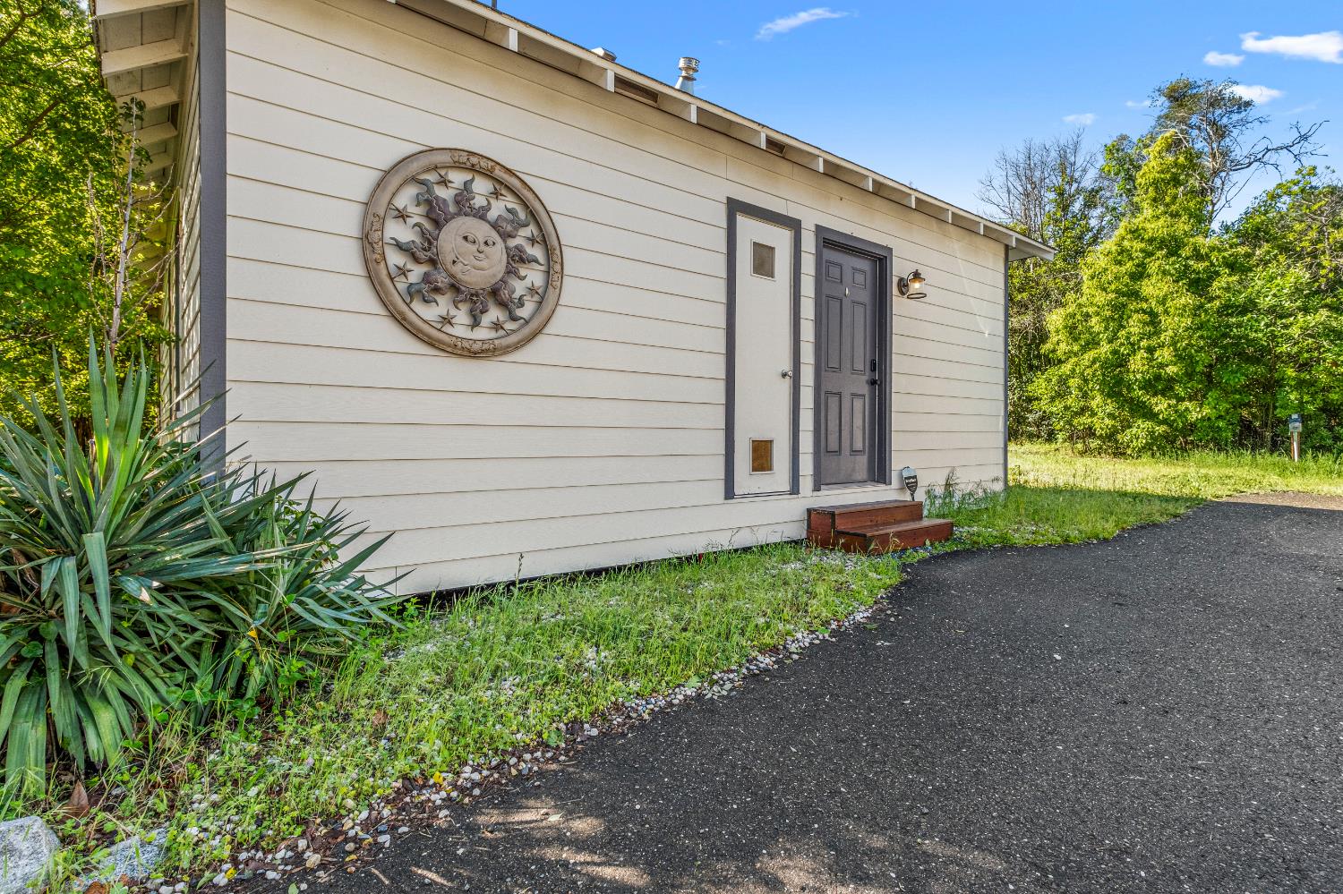 320 Taylor Road Newcastle, CA 95658 - Photo 46 of 75 a view of a house with a small yard and plants