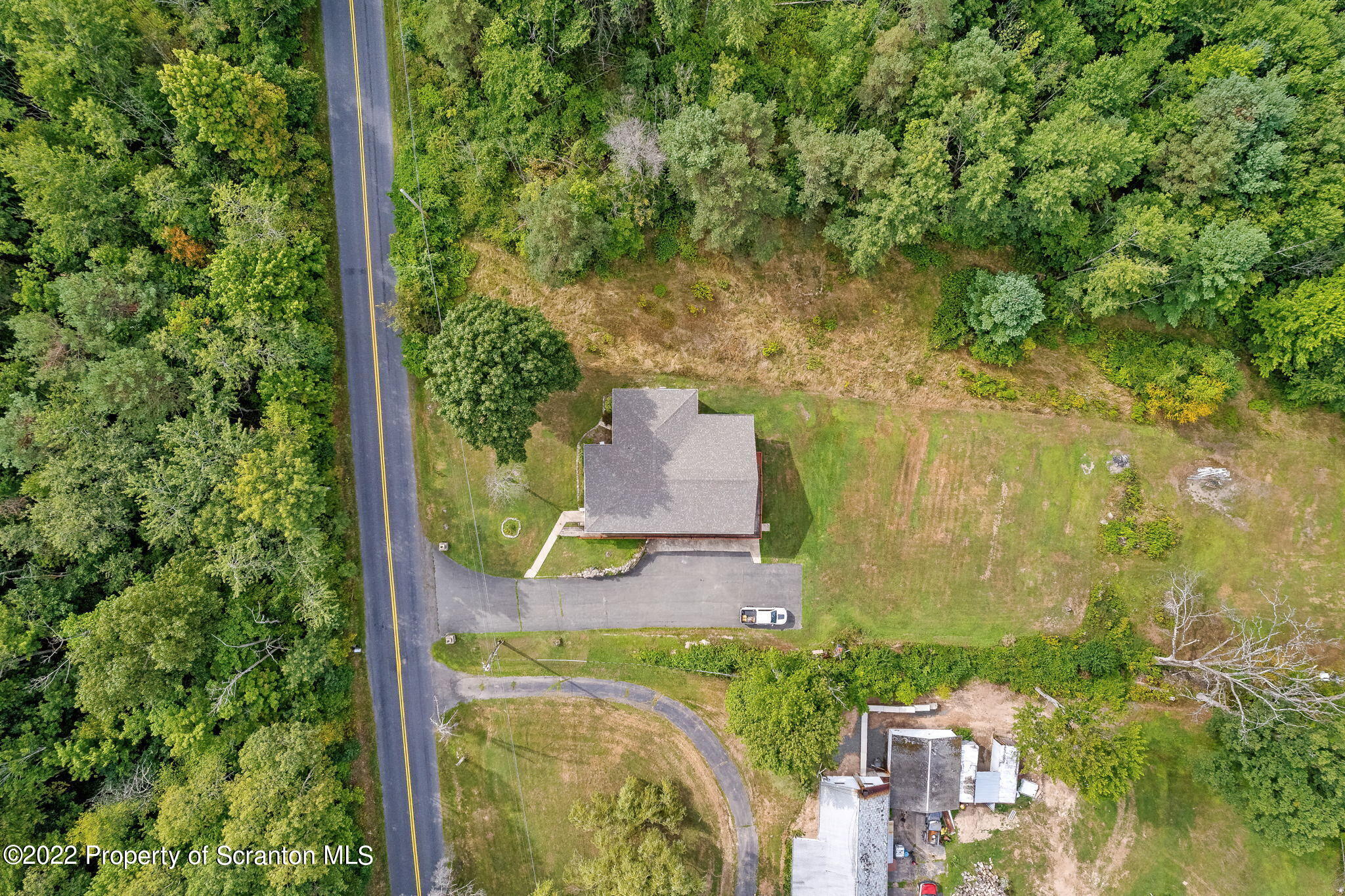 423 Fairview Road Dalton, PA 18414 - Photo 3 of 21 an aerial view of a residential houses with yard