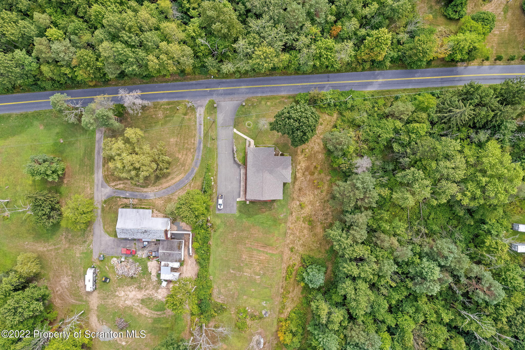 423 Fairview Road Dalton, PA 18414 - Photo 4 of 21 swimming pool with a garden view