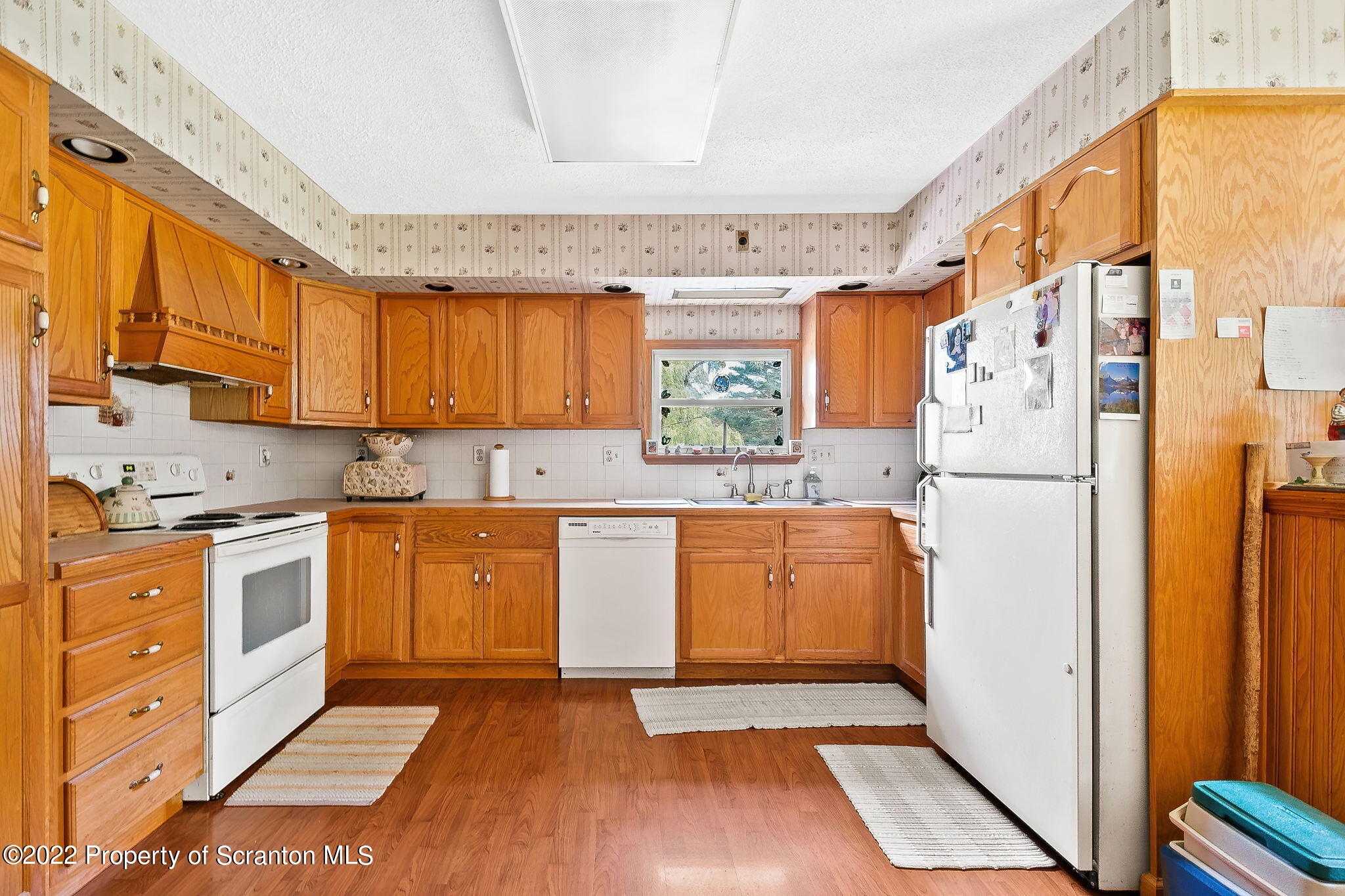 423 Fairview Road Dalton, PA 18414 - Photo 7 of 21 a kitchen with stainless steel appliances granite countertop a refrigerator and a stove top oven