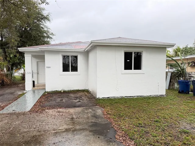 a view of backyard of house