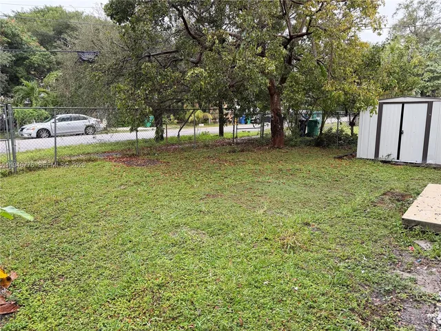 a view of park with trees