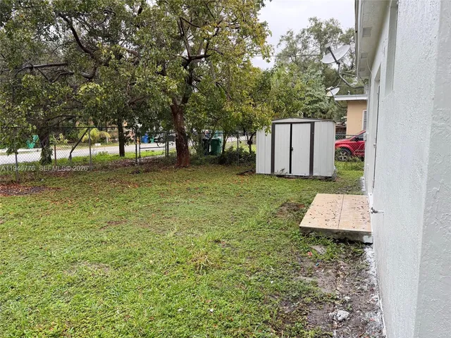 a backyard of a house with lots of green space