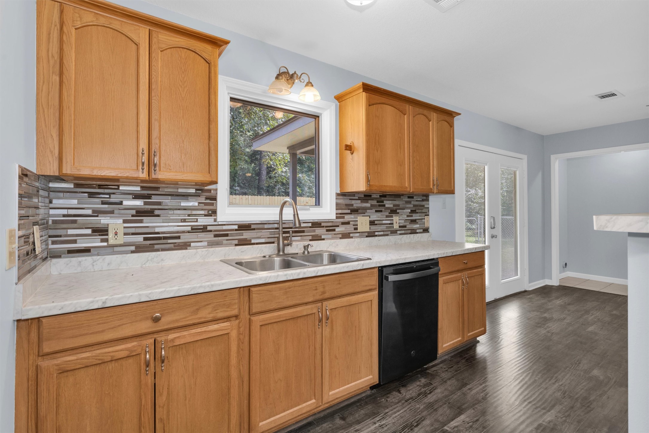586 Diggs Road Willis, TX 77378 - Photo 10 of 44 Love the window in the kitchen overlooking the backyard