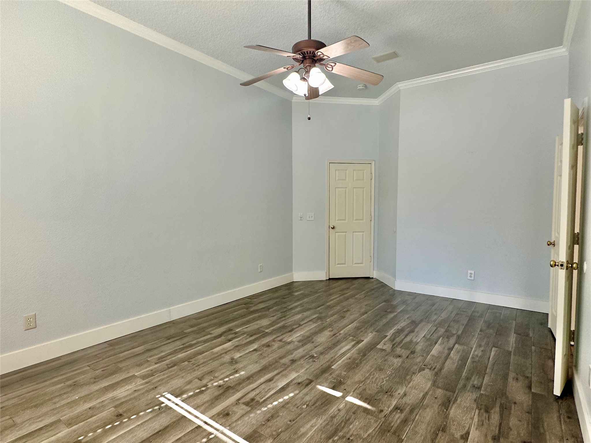 18 South Willow Point Circle Spring, TX 77382 - Photo 11 of 27 a view of an empty room with wooden floor