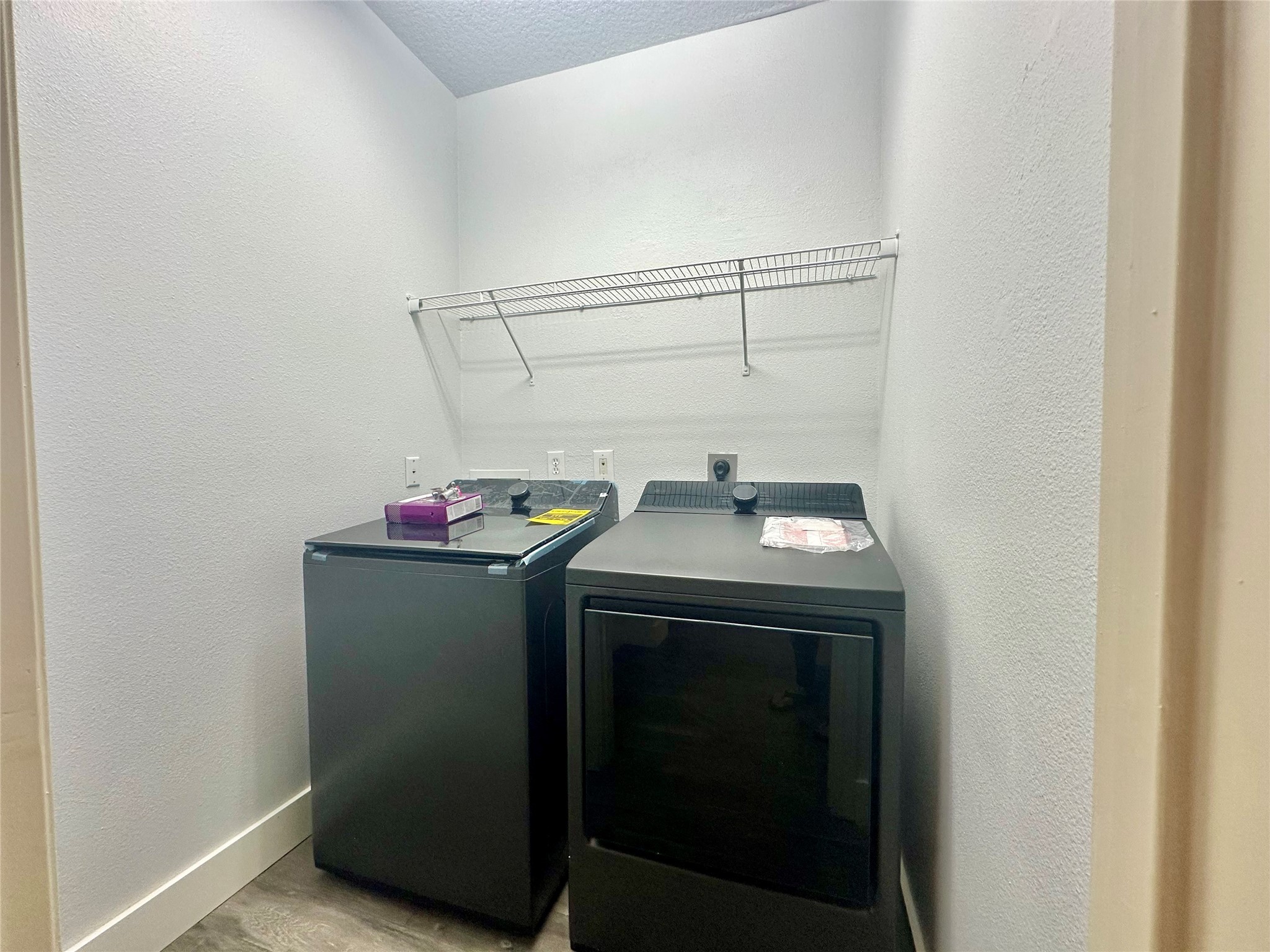 18 South Willow Point Circle Spring, TX 77382 - Photo 15 of 27 a utility room with dryer and washer