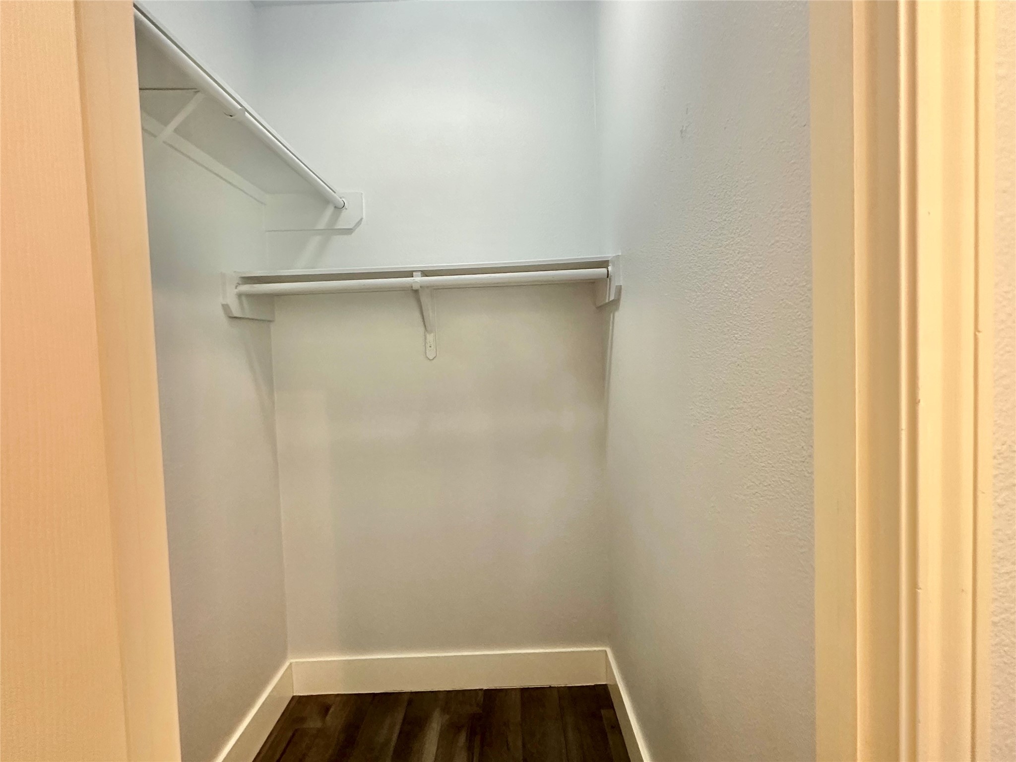 18 South Willow Point Circle Spring, TX 77382 - Photo 18 of 27 a view of walk in closet with empty racks