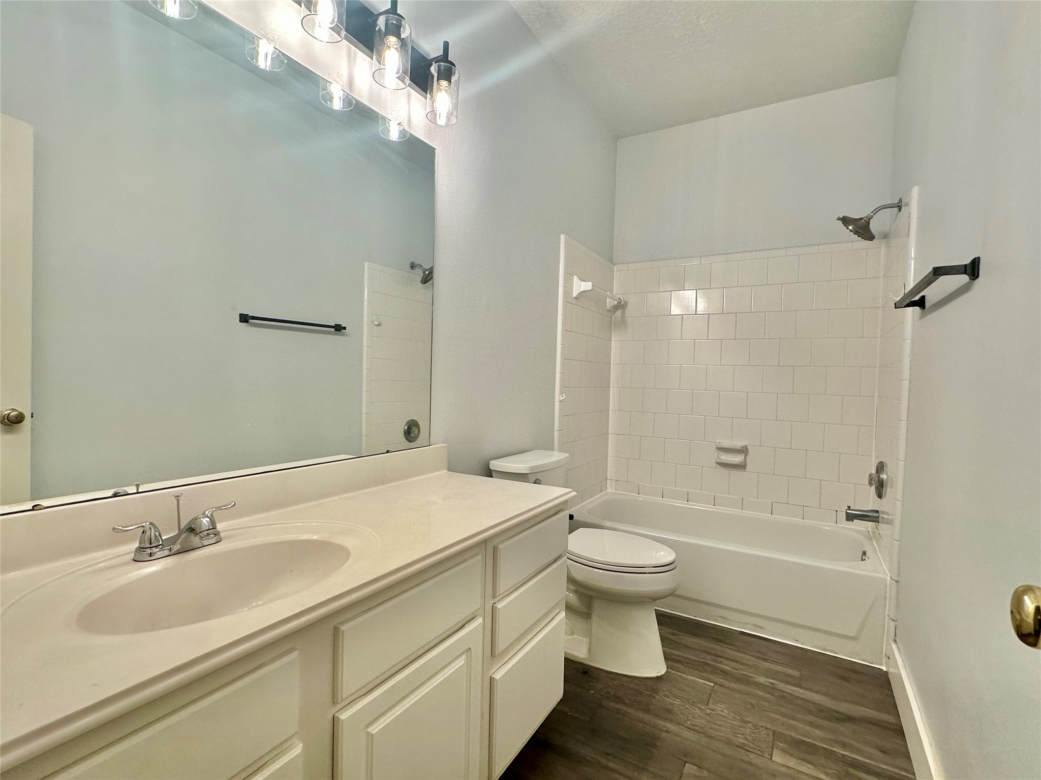 18 South Willow Point Circle Spring, TX 77382 - Photo 19 of 27 a bathroom with a sink a toilet and shower