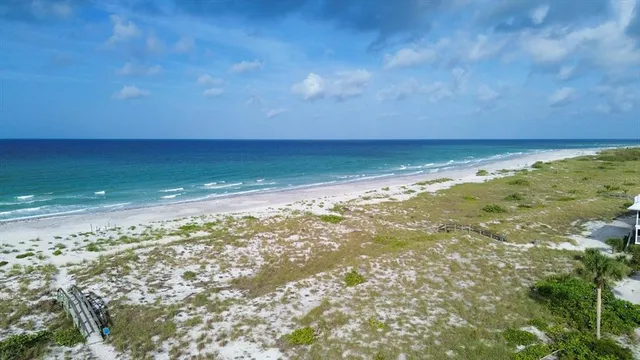 a view of a lake with a big yard