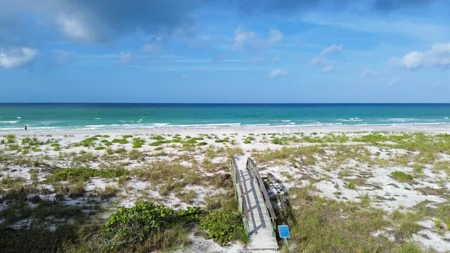 a view of a beach with a outdoor space