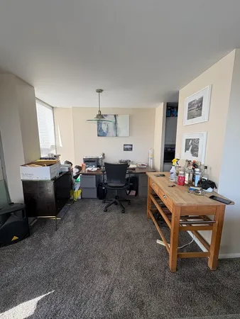a room with furniture and a rug