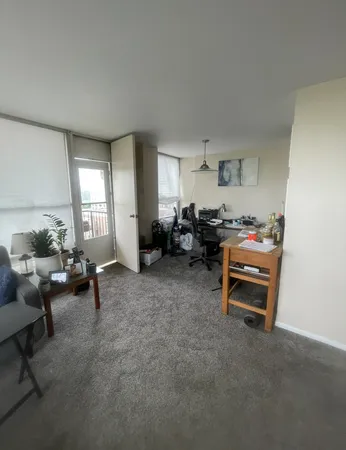 a living room with furniture and a couch