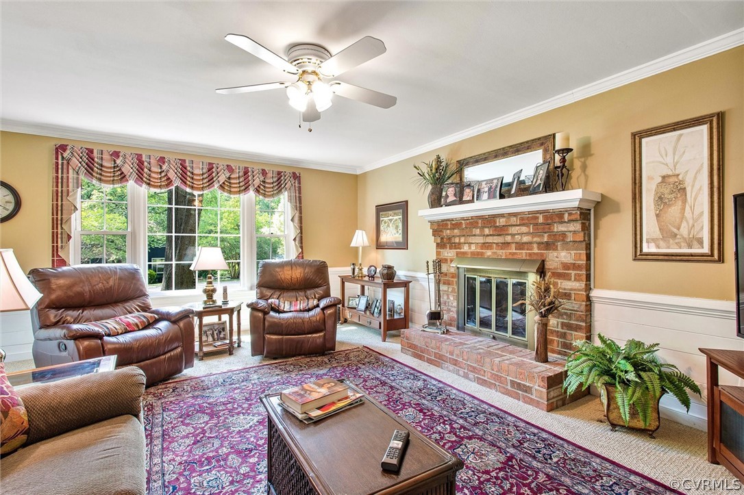 14209 Long Gate Road Midlothian, VA 23112 - Photo 12 of 36 a living room with furniture a fireplace and a large window
