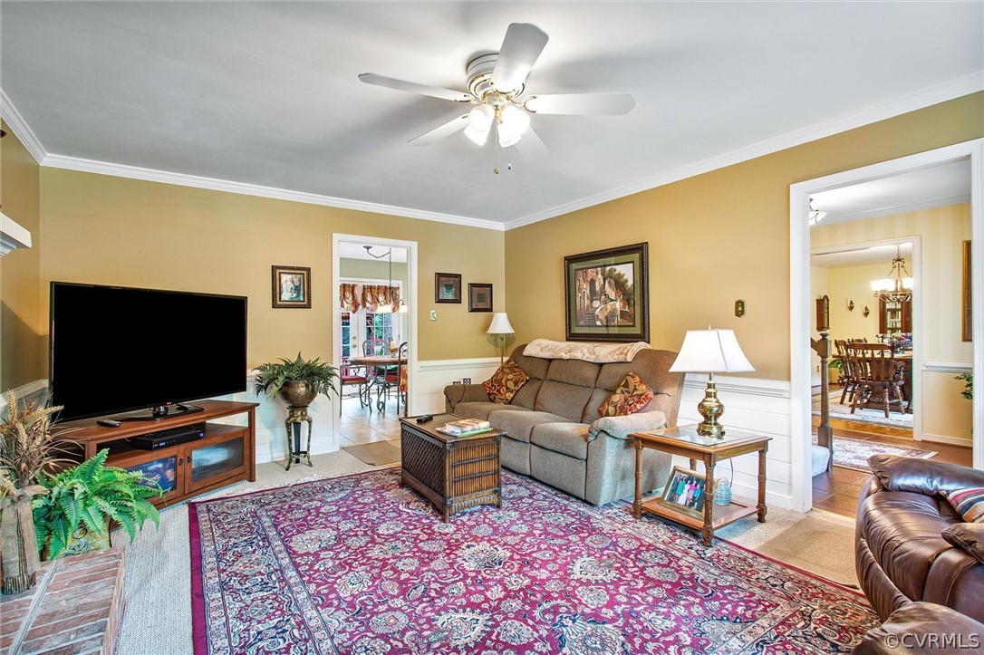 14209 Long Gate Road Midlothian, VA 23112 - Photo 13 of 36 a living room with furniture and a flat screen tv