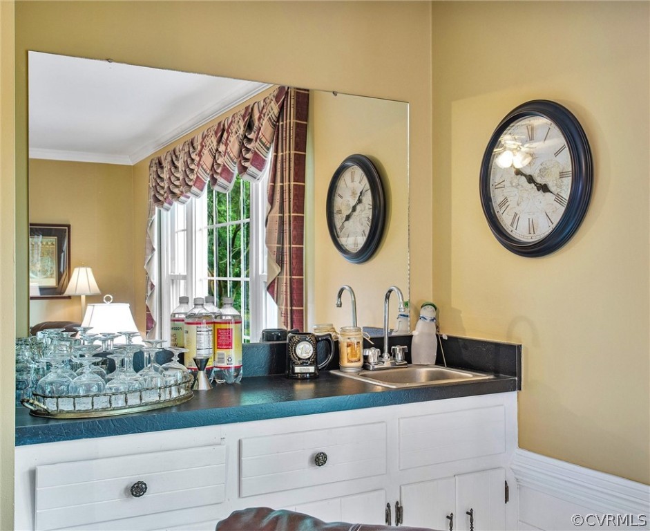 14209 Long Gate Road Midlothian, VA 23112 - Photo 14 of 36 a clock on a table in a kitchen