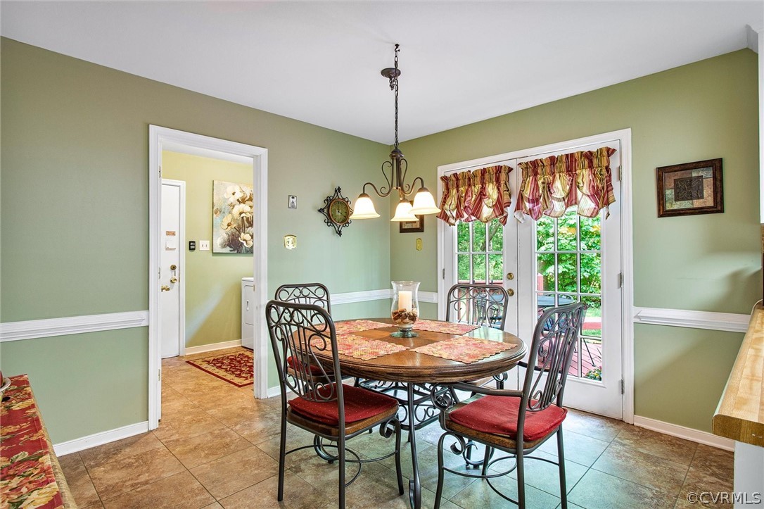 14209 Long Gate Road Midlothian, VA 23112 - Photo 19 of 36 a view of a dining room with furniture window and wooden floor