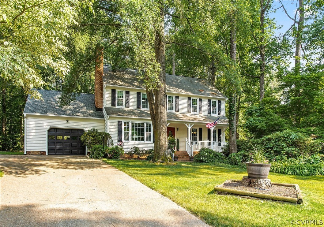 14209 Long Gate Road Midlothian, VA 23112 - Photo 2 of 36 a front view of a house with a yard and fountain