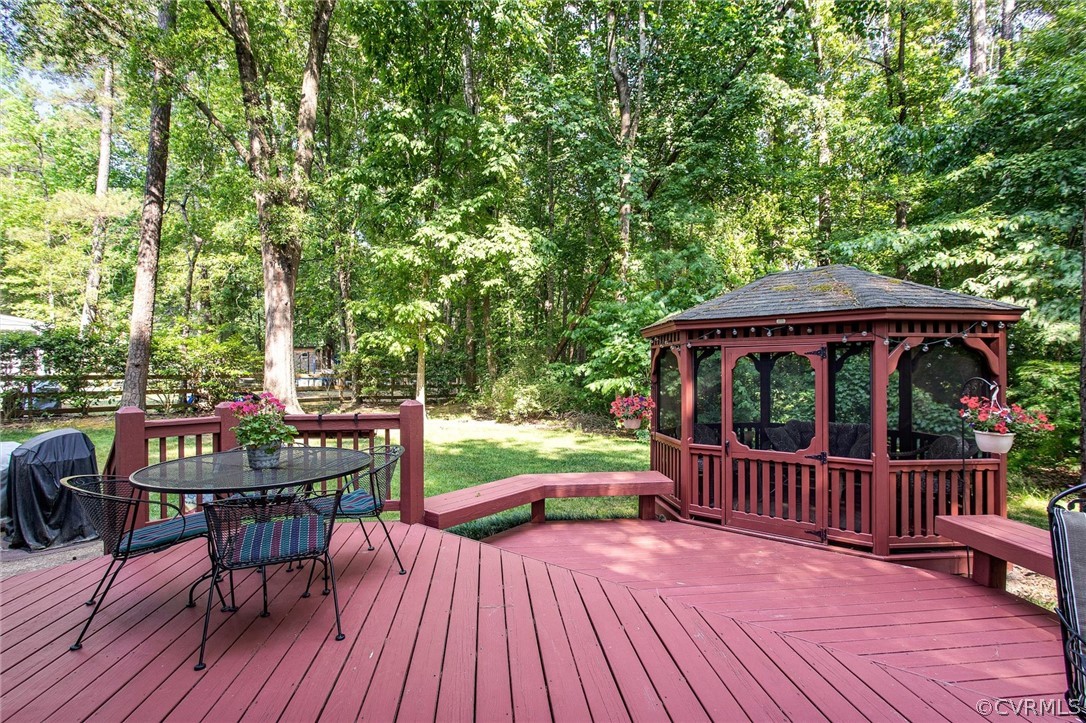 14209 Long Gate Road Midlothian, VA 23112 - Photo 30 of 36 a view of a chairs and table on the wooden deck