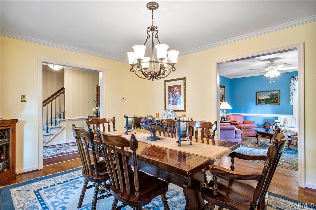 14209 Long Gate Road Midlothian, VA 23112 - Photo 9 of 36 a view of a dining room with furniture and wooden floor