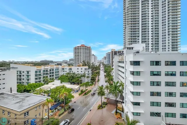 a view of a balcony with city view