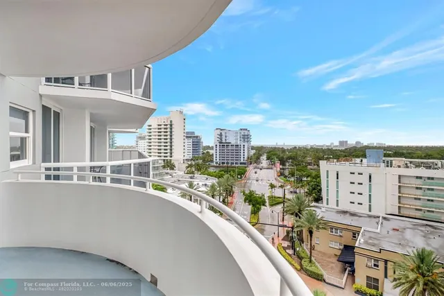 a kitchen with stainless steel appliances a sink and a refrigerator