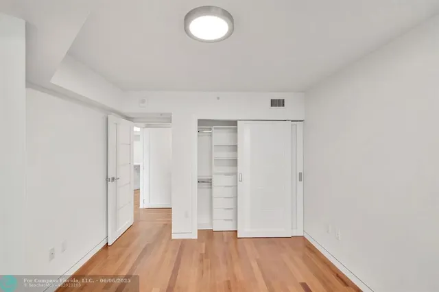 a living room with fireplace furniture and a flat screen tv