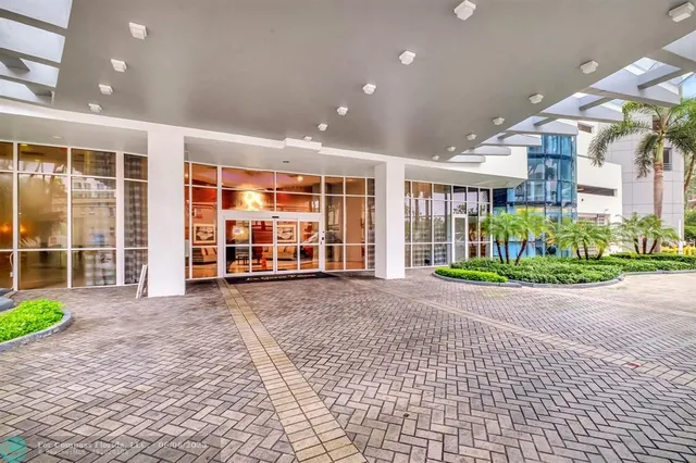 a view of a building with a garden