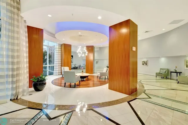a large kitchen with a table and chairs