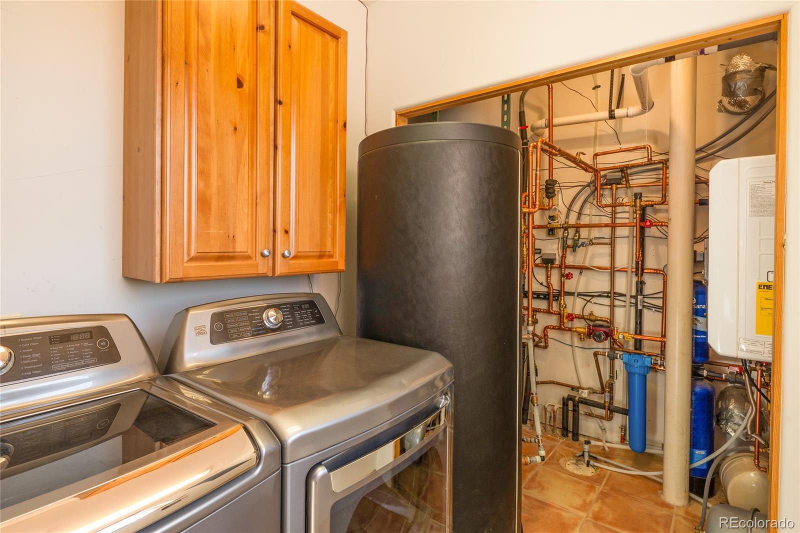 1329 Moonlight Way Crestone, CO 81131 - Photo 40 of 50 a kitchen with a refrigerator and a sink