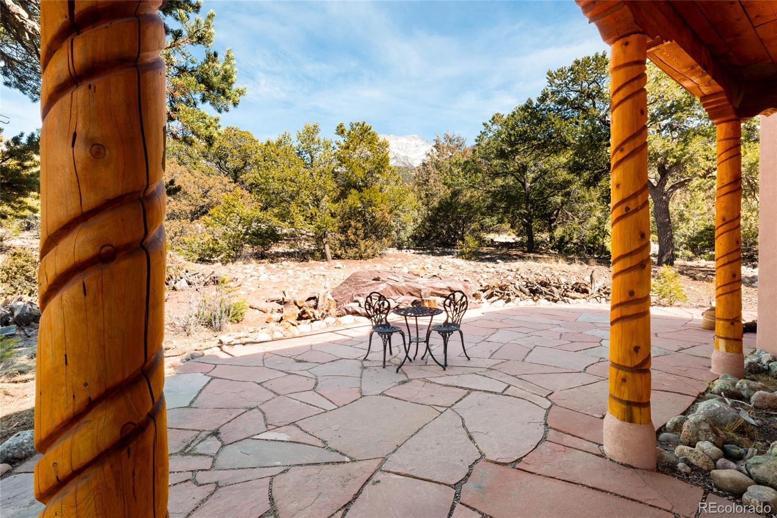 1329 Moonlight Way Crestone, CO 81131 - Photo 44 of 50 a view of a patio with a table and chairs and potted plants
