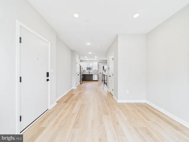 a view of livingroom with furniture and closet