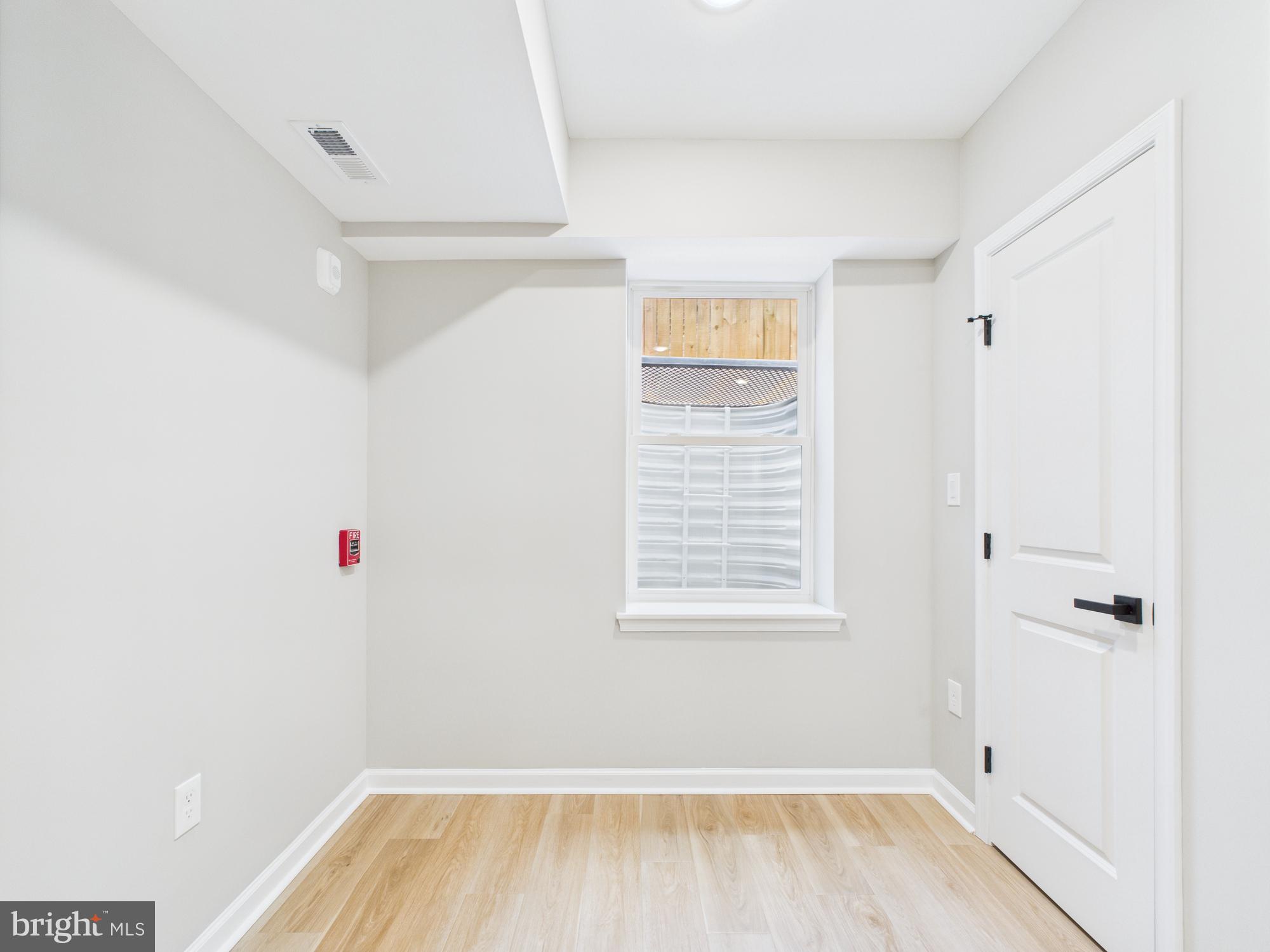 1320 Grove Street, Unit 2 Philadelphia, PA 19146 - Photo 4 of 15 a view of a room that has a window