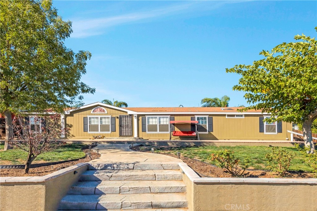18495 Darin Drive Perris, CA 92570 - Photo 1 of 1 front view of a house with a yard