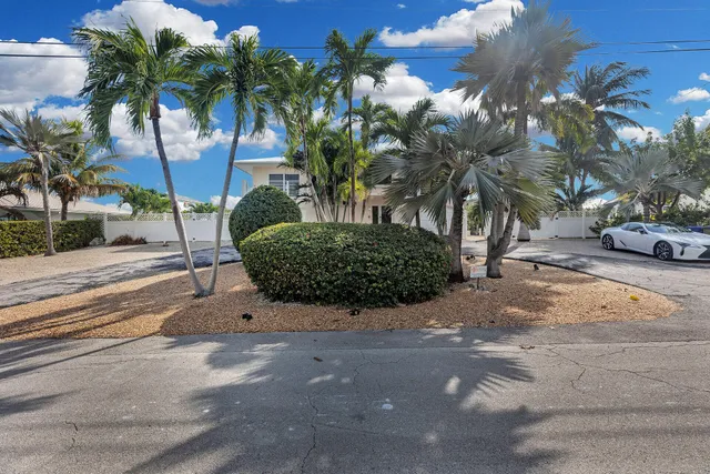 a view of a livingroom with furniture and front door