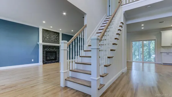 a view of entryway with wooden floor
