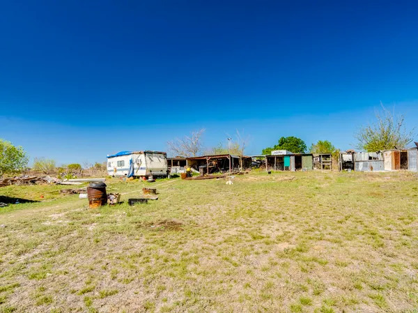 a view of swimming pool with seating area