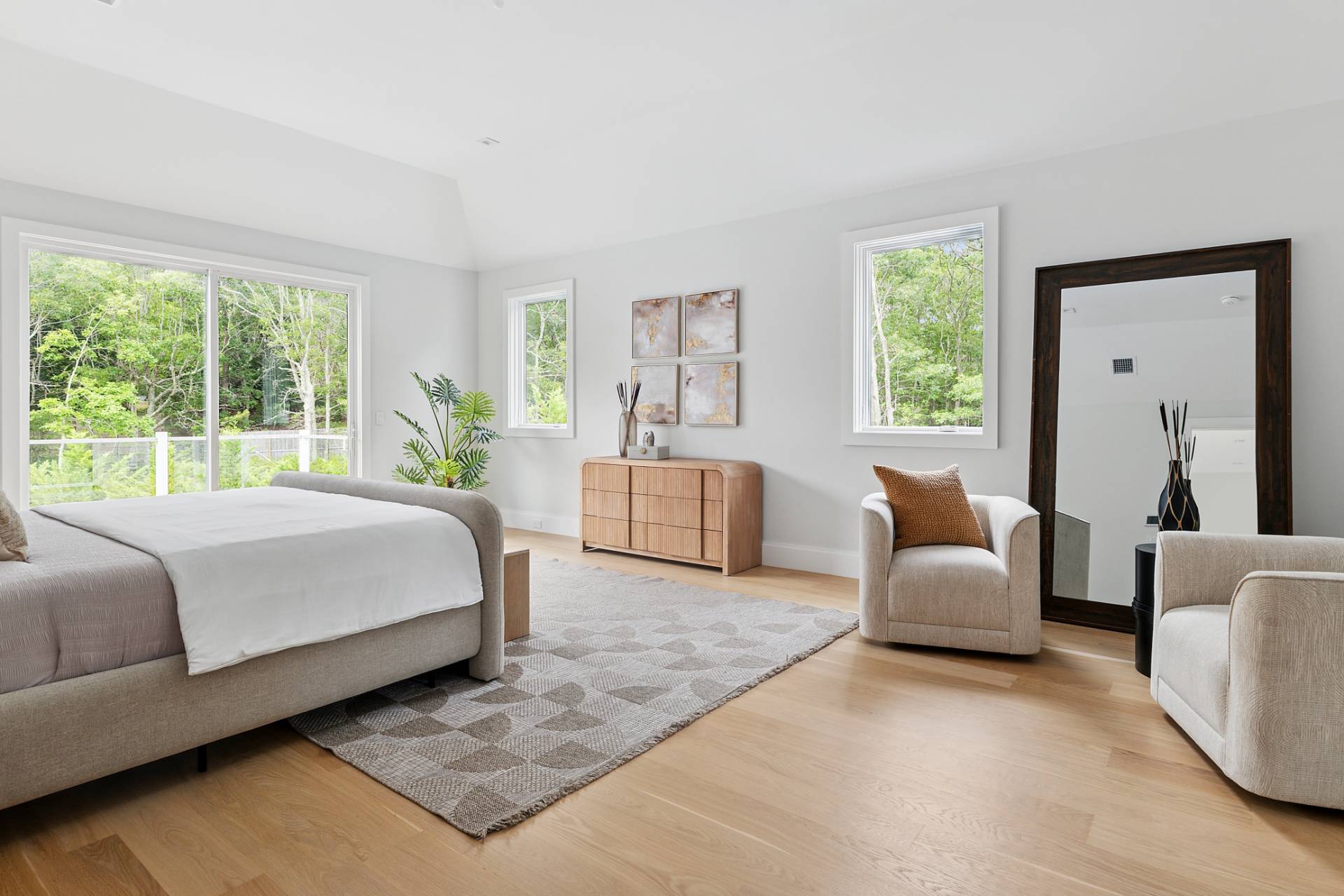 2061 Deerfield Road Sag Harbor, NY 11963 - Photo 13 of 33 a bed room with a bed and a couch